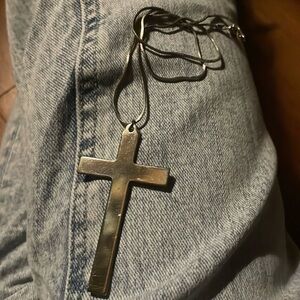 Silver colored cross necklace